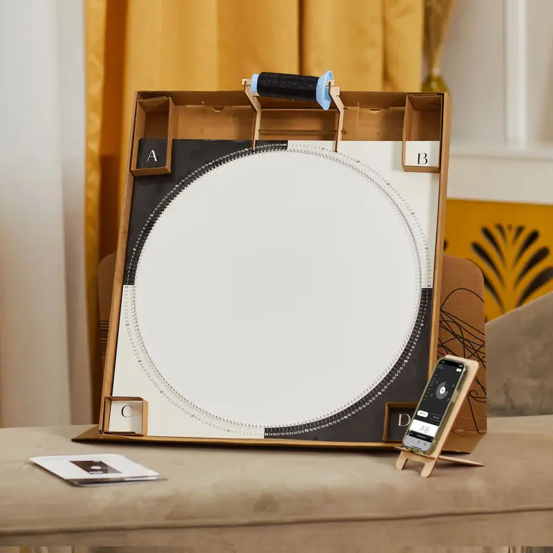 Pre-installed nails form the framework for your string masterpiece.